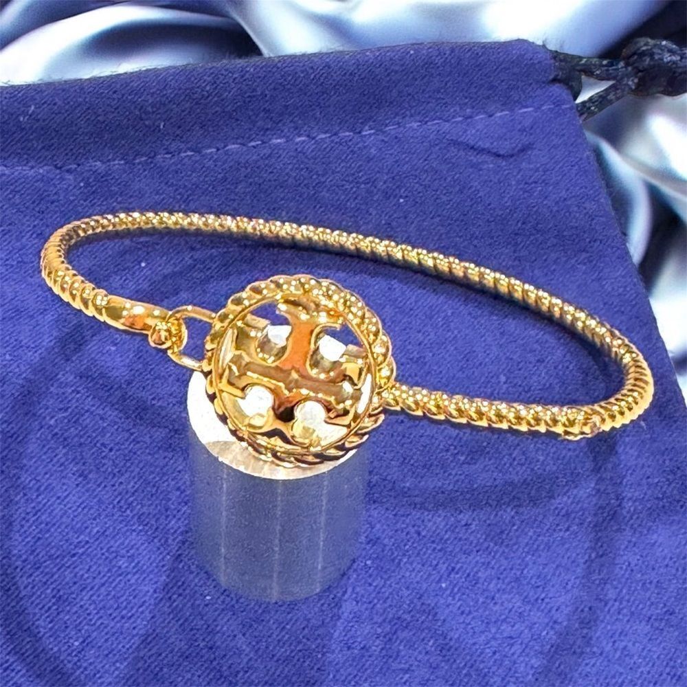 TORY BURCH ROPE HINGED 18KGOLD OVER BRASS BRACELET